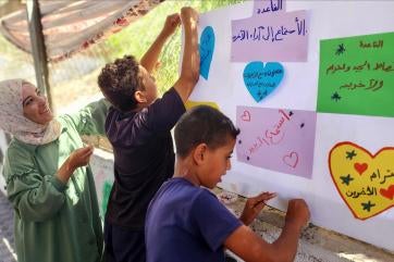 Palestine community members participate in a youth program.