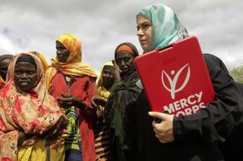 Prosper global staff member jasmine avgerakis with refugees in baidoa, somalia.