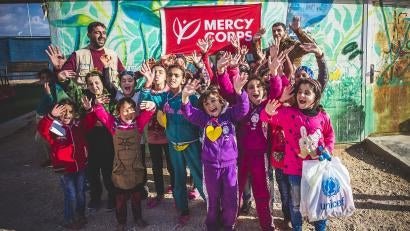 Jordanian children waving and smiling