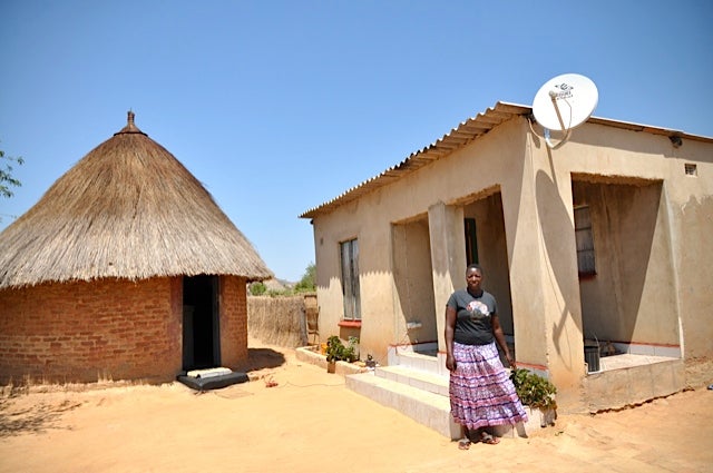 Woman outside house