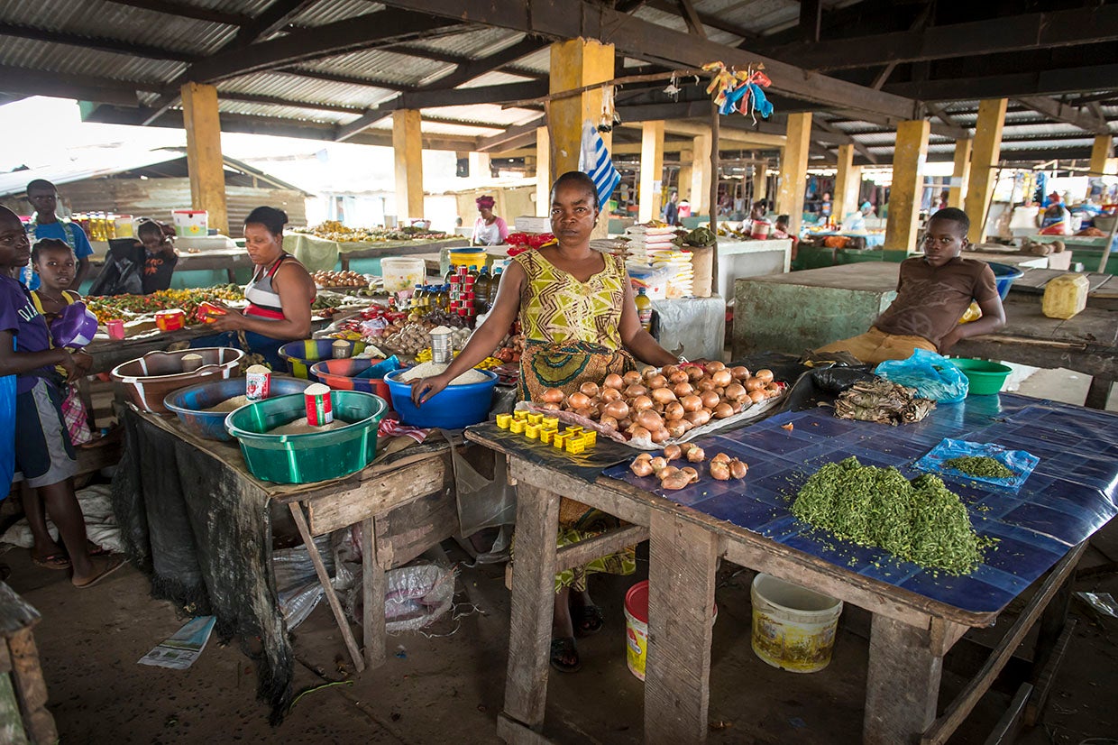 Sarah, 46, grows and sells cassava, onions and other vegetables as a way to help her husband earn a living and feed their children. But when Ebola hit this area of Liberia, officials tried to stem its spread by restricting travel and public gatherings. "There was no way to get to the market," she says. One of Prosper Global’s main objectives in Liberia was to improve food security in the wake of the Ebola crisis. Photo: Sean Sheridan for Prosper Global
