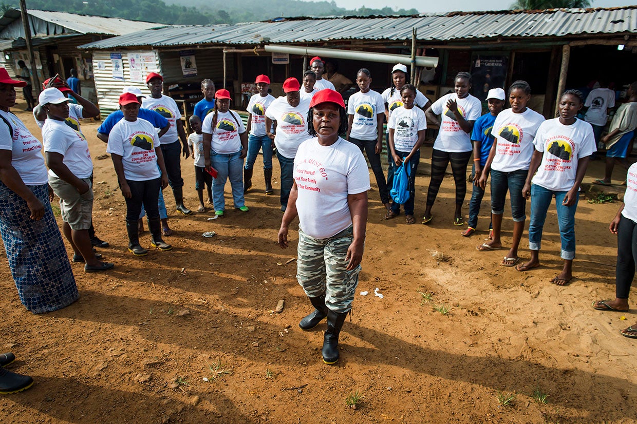 During the 2014 Ebola outbreak, community educators for the Centre for Liberian Assistance mobilize in Robertsport for a community outreach event on the dangers of Ebola. Photo: Sean Sheridan for Prosper Global