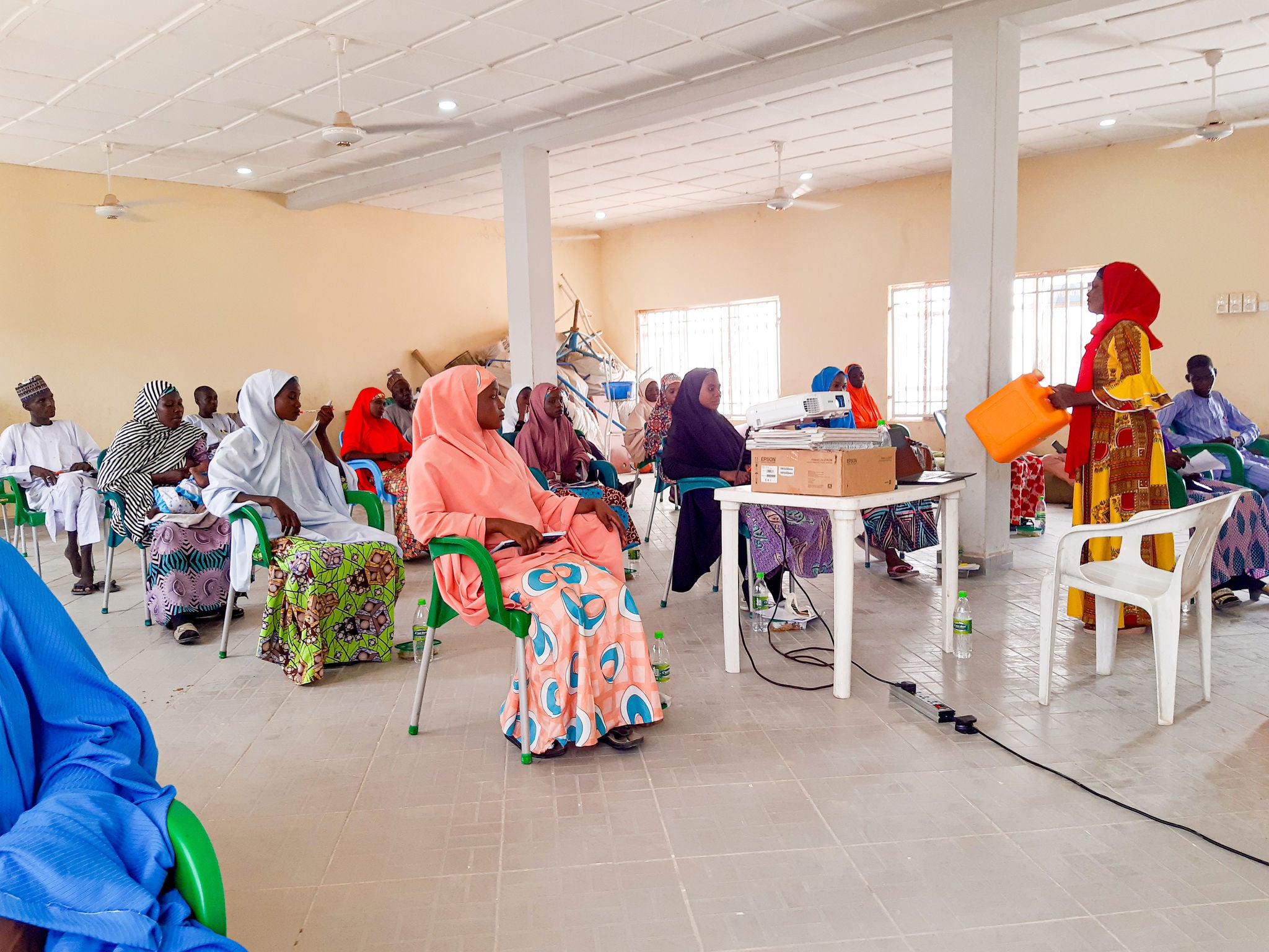 Nigeria classroom and Covid-19 prevention is being taught.