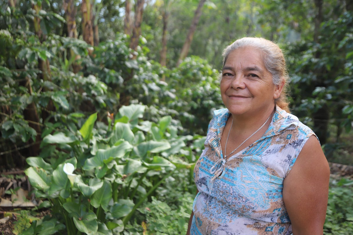 An image of Rosario Rodriguez, a second-generation coffee producer who helps lead her farmer co-op.
