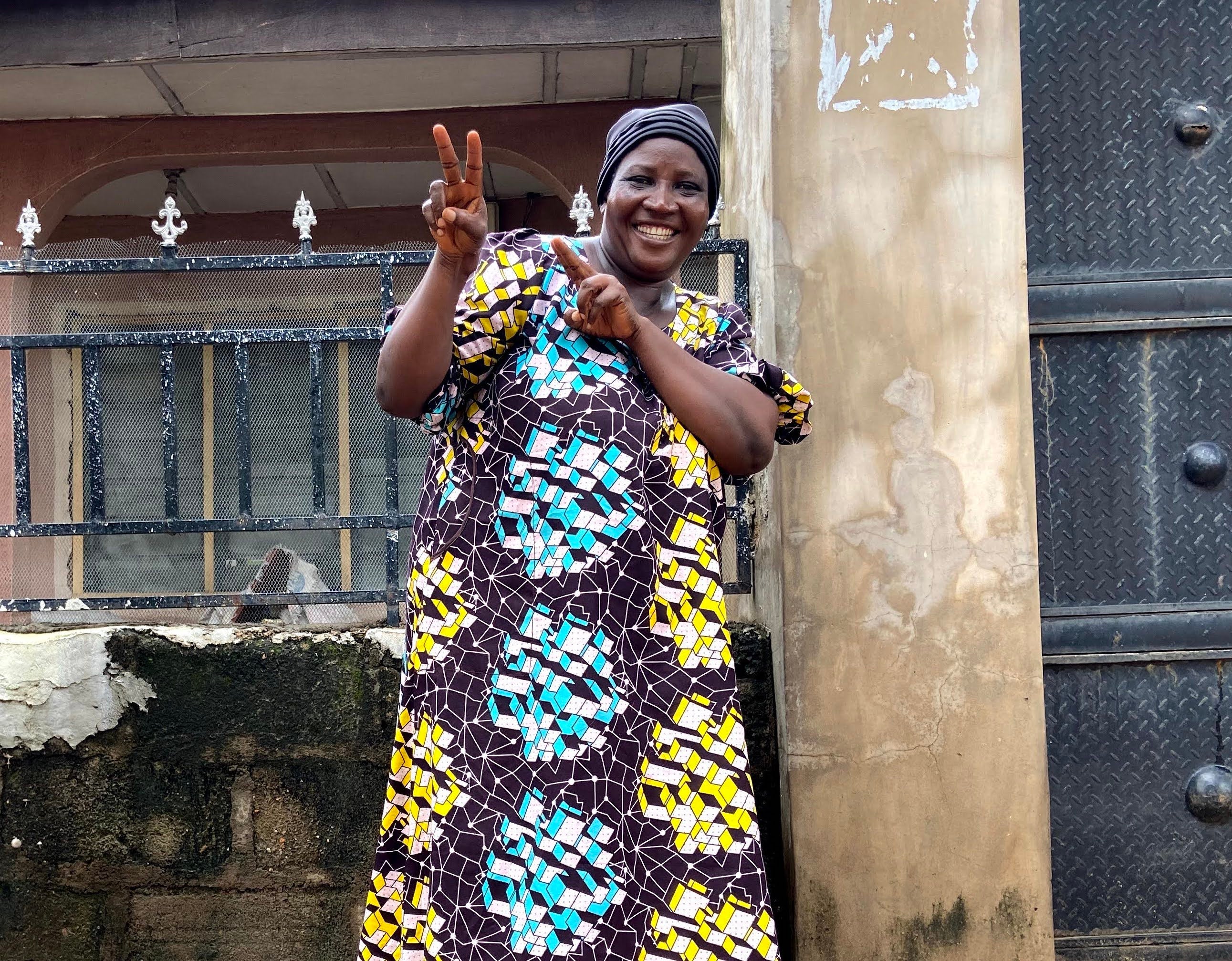 A person gesturing for the camera.