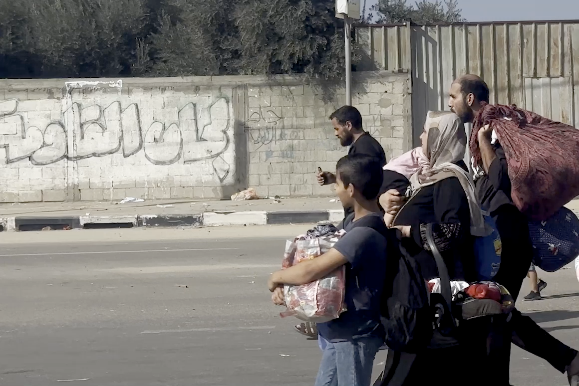 In central Gaza, Palestinians flee from northern Gaza to the south after the Israeli army issued an evacuation warning.