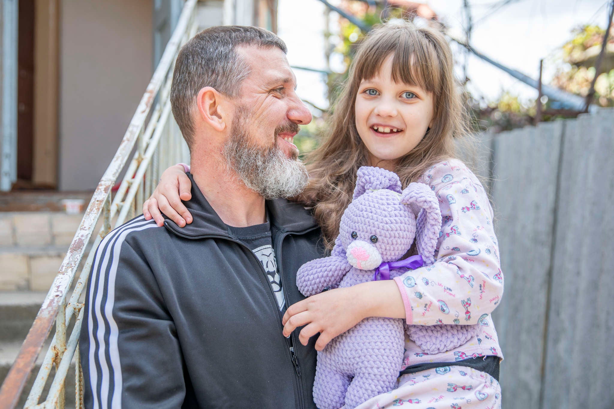 A husband and father of two with his youngest daughter.