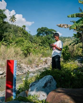 As a member of the local emergency readiness group, marwan helps monitor river water levels to provide early flood warnings to his community.