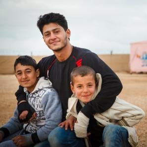 Sami is a volunteer at one of prosper global's child-friendly spaces in zaatari camp. his work has given him a new sense of purpose, and he's now sharing that with others. photo: sumaya agha for prosper global