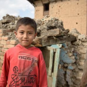 Boy in red shirt