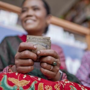 Woman holding cash