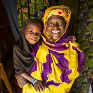 Hawa, a single mother in niger, must find new ways to feed herself, her daughter ramatou and her goats when drought hits. photo: sean sheridan for prosper global