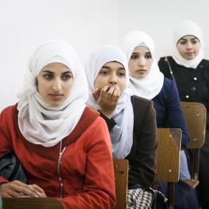 Syrian and jordanian women in a classroom.