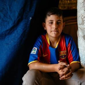 Hammoudi sitting with hands folded
