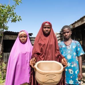 Nigerian siblings struggling with hunger.