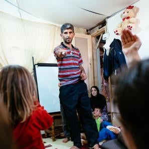 Ziad with his family teaching