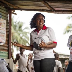 Community educators for the centre for liberian assistance mobilize for community outreach on the dangers of ebola. photo: sean sheridan for prosper global