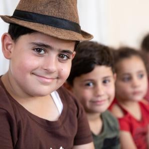 Children smiling at camera