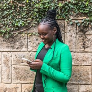A person using a mobile device.