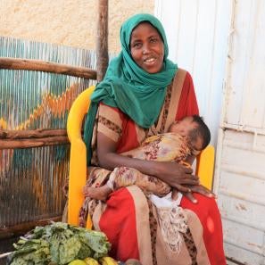 Ethiopian woman holding baby