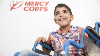 Boy in jordan in a wheelchair